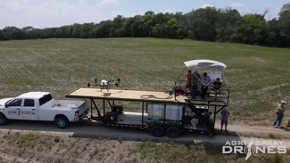 Pickup and field support trailer with an aircraft platform, liquid tanks and equipment.