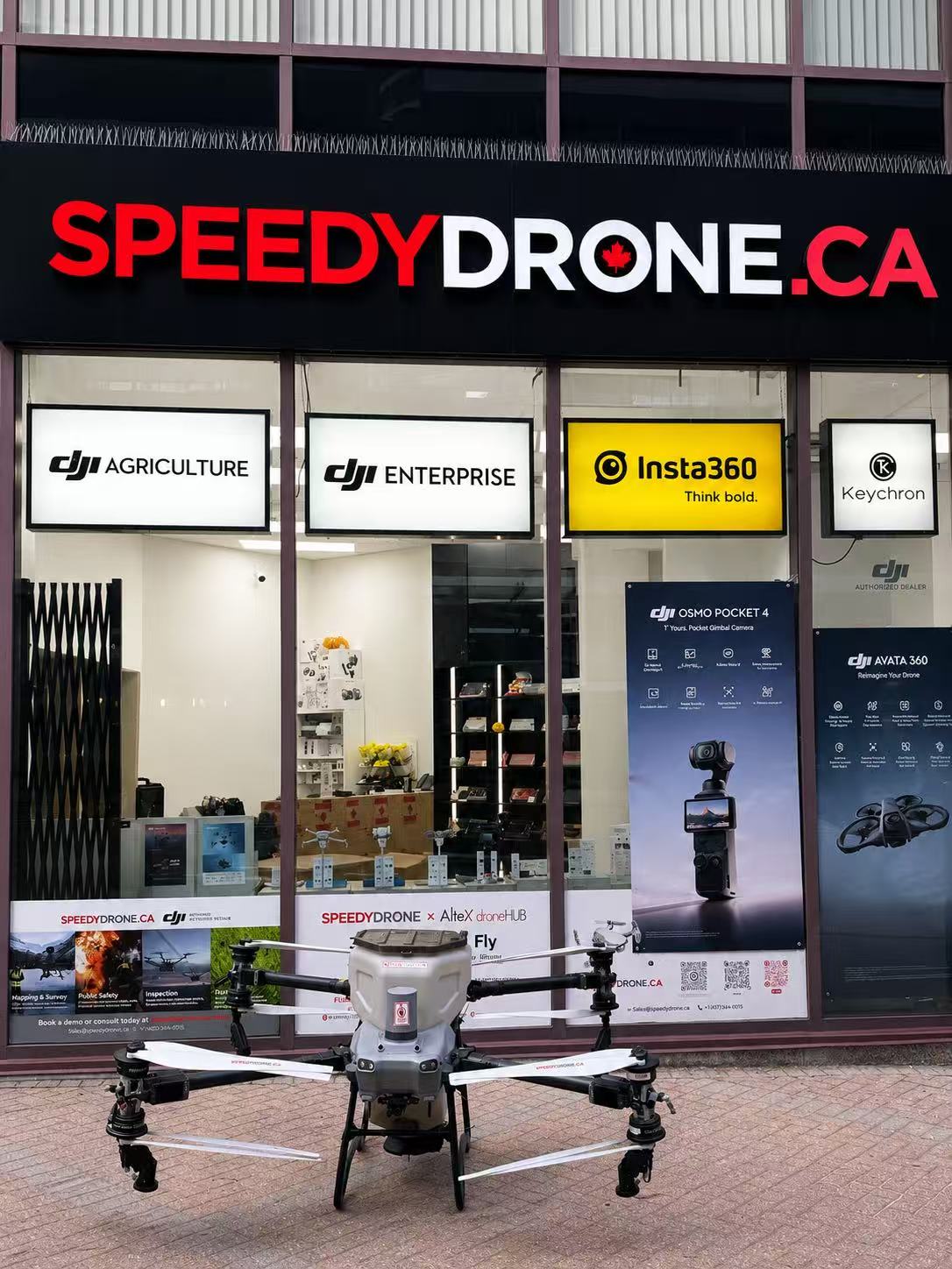 SpeedyDrone Canada storefront with an AGRAS aircraft outside the entrance
